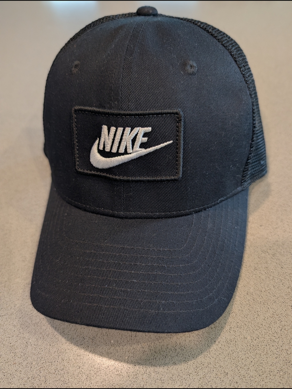 Nike Black and White Patch Logo Trucker Hat